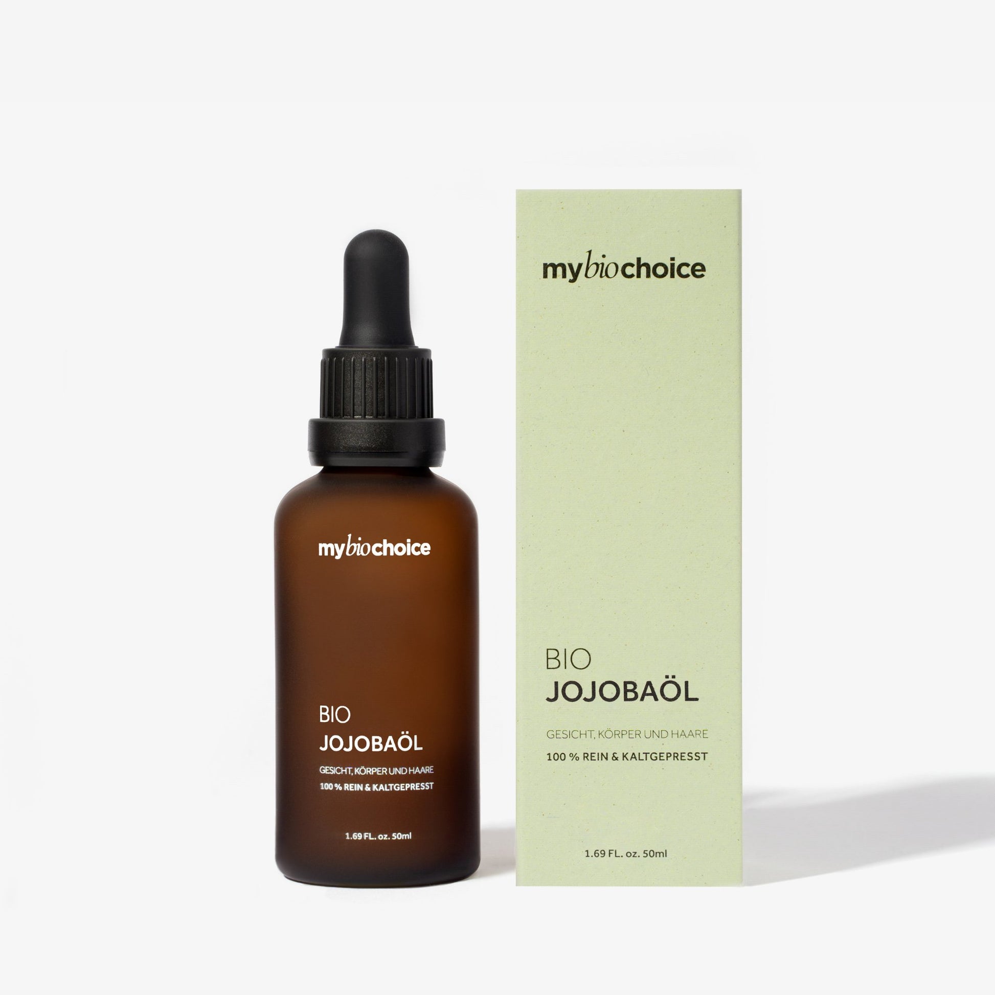 mybiochoice Bio Jojobaöl in einer 50 ml matten Bernsteinflasche mit Pipette für Gesicht, Körper und Haare, neben Verpackung.